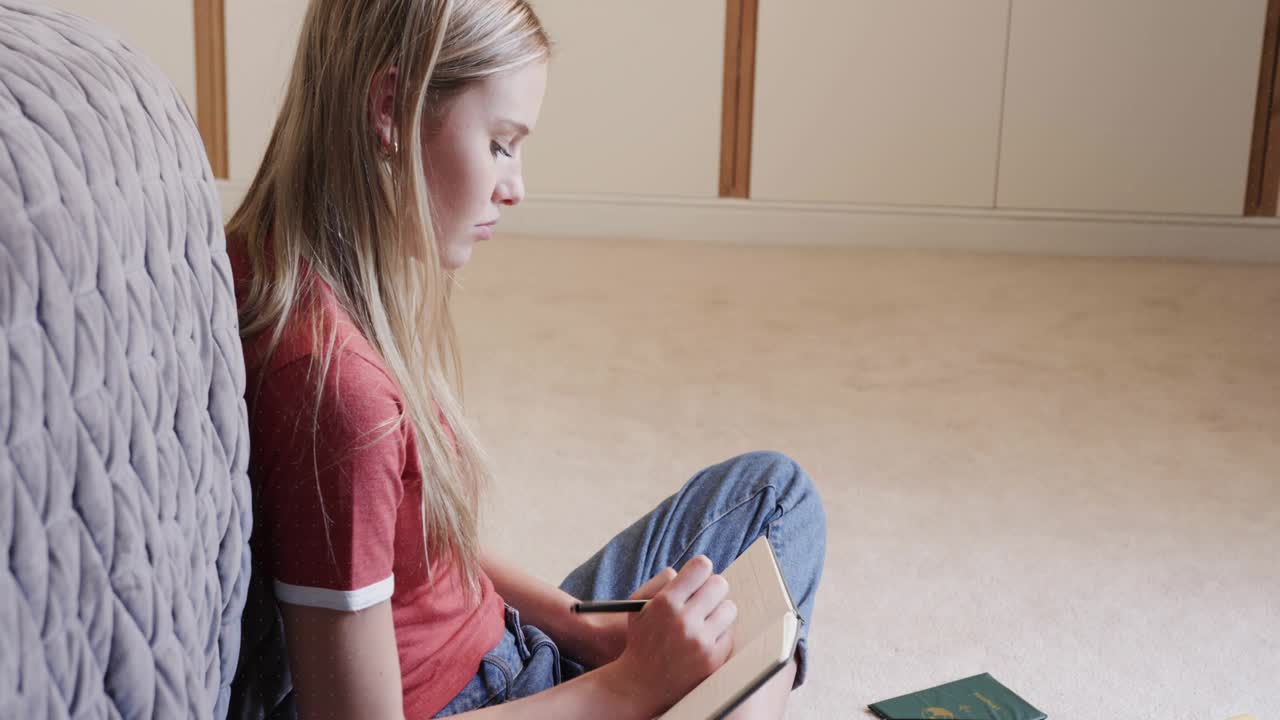 Female sitting cross-legged on carpet, HUD rings appearing over notebook, guiding writing for study