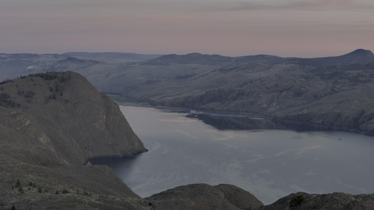 Drone Panorama of Battle Bluff next to Kamloops Lake's Desert Grassland Framing the Horizon