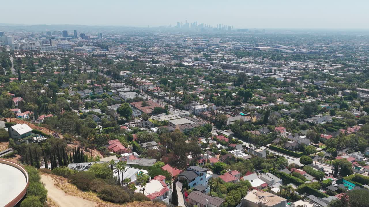 Wide panning aerial shot of downtown Los Angeles as seen from Hollywood Hills in Southern California. 4K