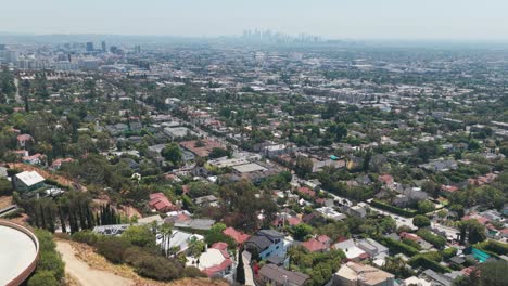 wide panning aerial shot of downtown los angeles as seen from hollywood hills in southern california. 4k