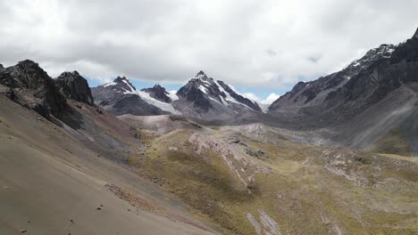 imposing ausangate mountain geologic formation, stunning aerial of andes, peru