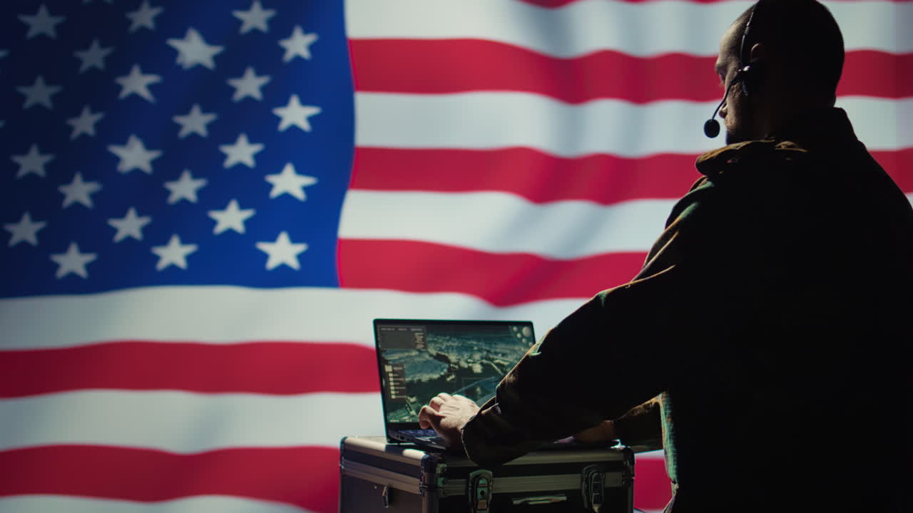 US Air Force agent using radar on laptop to detect incoming ballistic missiles