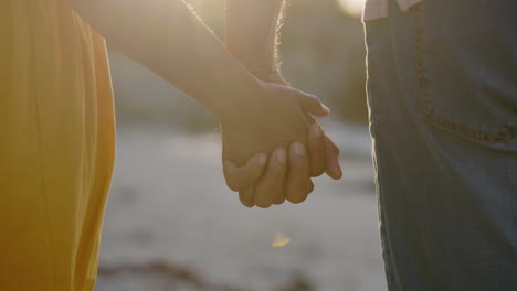 back, couple and holding hands at beach for love