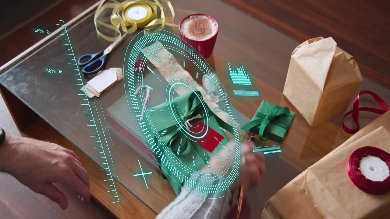 Mature man reaching for ribbon and wrapping holiday gift on glass table, AR technology guiding