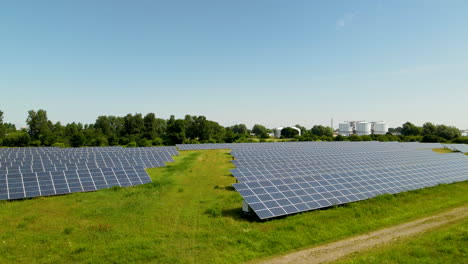 aerial view of powerful eco friendly solar panels farm during sunlight in europe