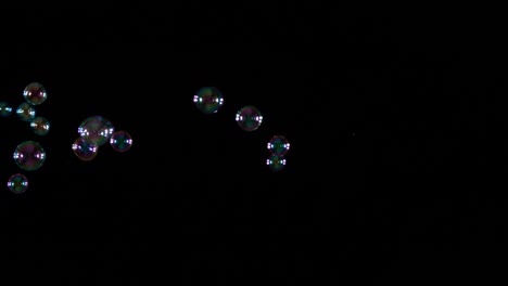 soap bubbles on black background