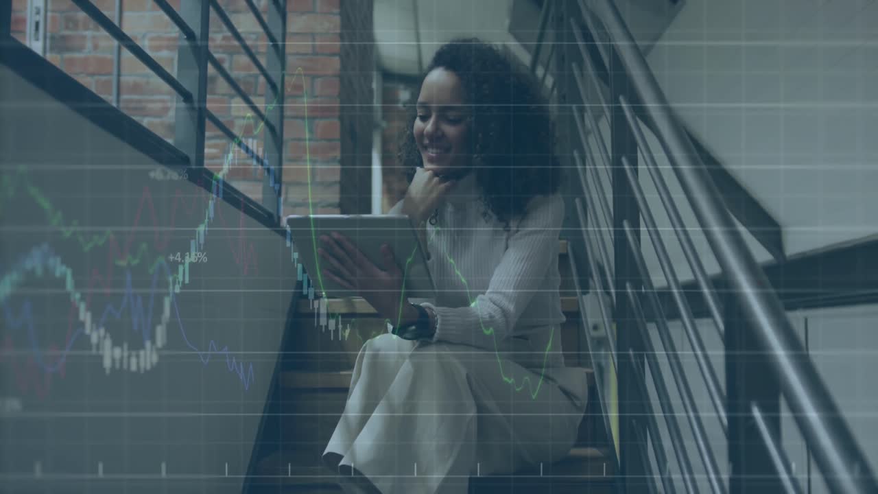 Animation of financial data processing over biracial businesswoman using tablet