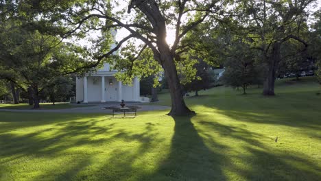 Gimbal-shot-sun-through-trees-at-Chapel-in-West-Virginia-summer-afternoon