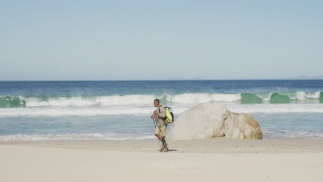 Sporty-mixed-race-man-with-prosthetic-leg-hiking