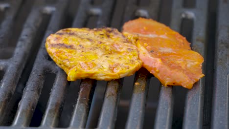 preparing fresh meat on the bbq grill for