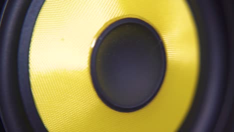 speakers vibrating to the beat yellow