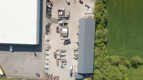 top down aerial of busy metal recycling center