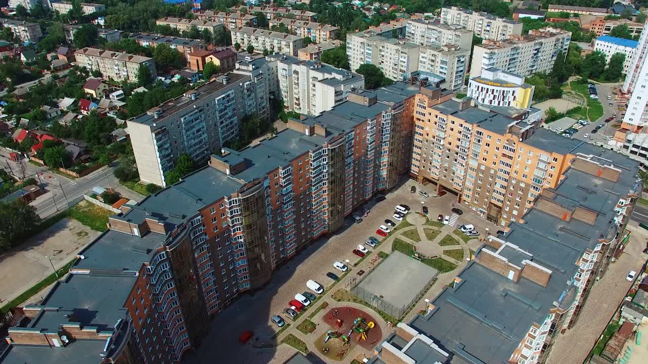 Modern city complex. High-raised buildings in the center of the city. New residential apartments. Aerial view.