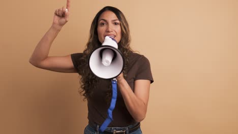 woman using a loudspeaker and yelling positive