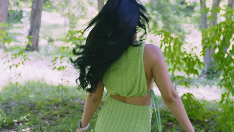 amazing young woman spins while her hair flows in the wind