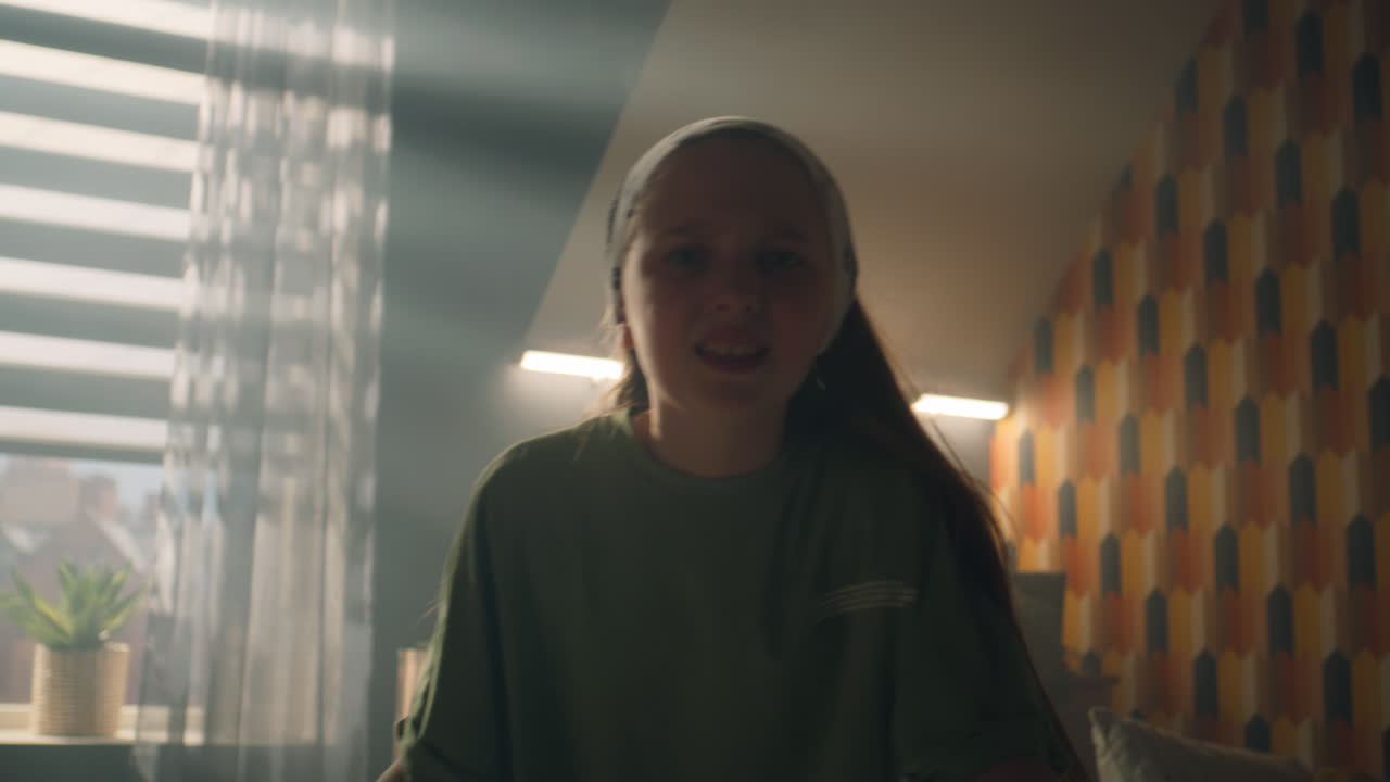 Young Girl Dancing and Singing against White Background Young Girl Dancing and Singing against White Background