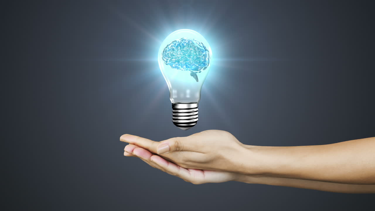 Hands presenting light bulb with brain