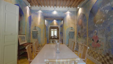 Interior-shot-of-religious-wall-murals-within-a-dining-room-within-the-Chateau-de-Castille