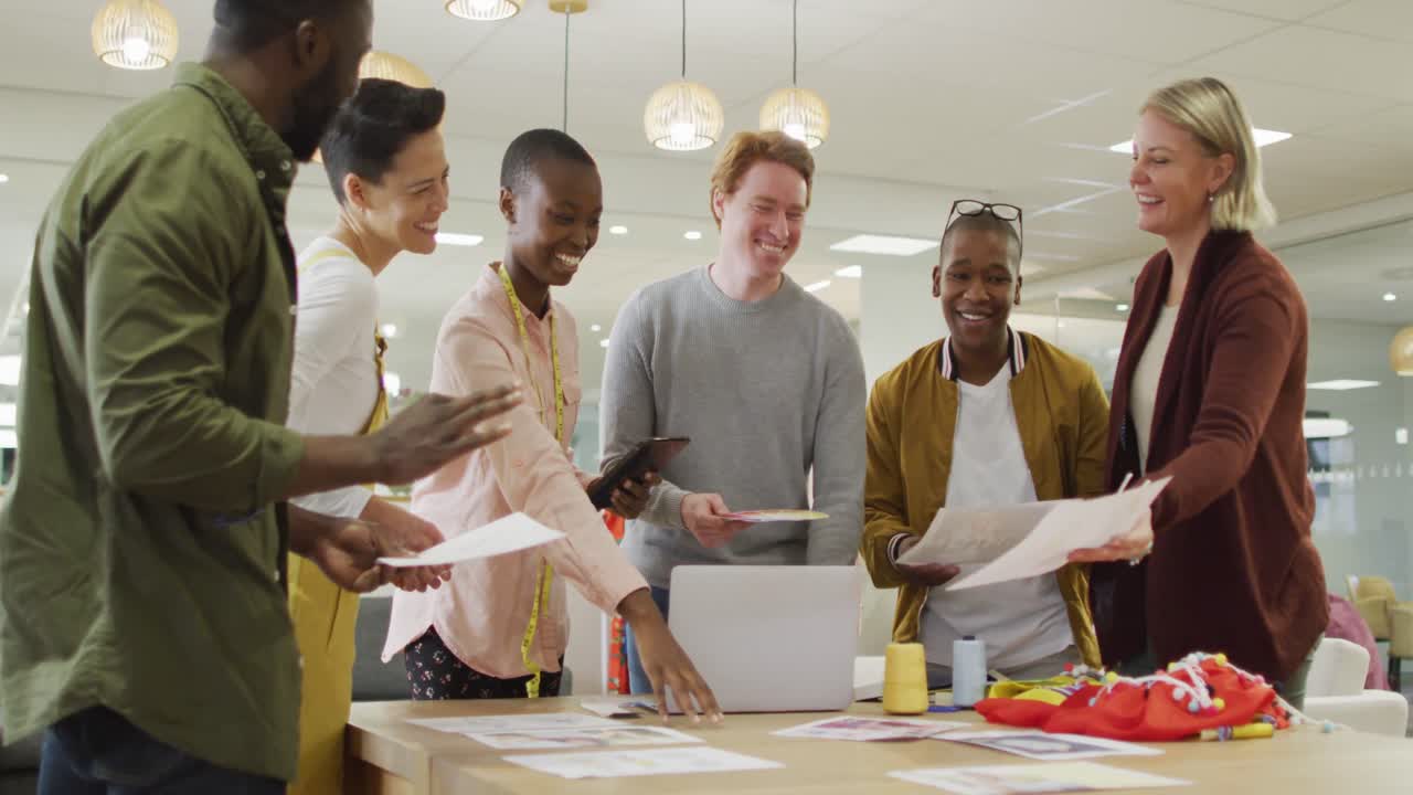Diverse group of male and female business colleagues working in office