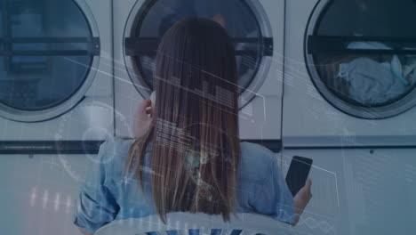 animación del procesamiento de datos financieros sobre una mujer usando un teléfono inteligente en la lavandería.