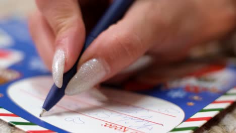 mom with children write a letter to santa claus mom with children write a letter to santa claus happy family on new years eve