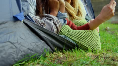 happy women clicking selfie in camping tent 4k