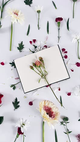 floral arrangement with notebook