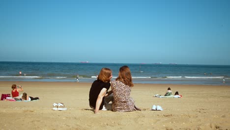 couple relaxing on a sunny beach