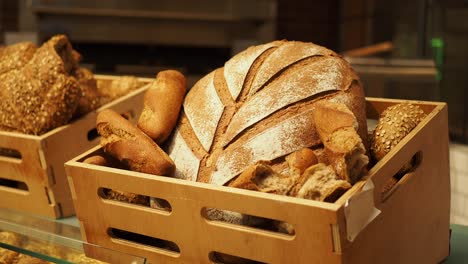 assortment of bread in a wooden crate