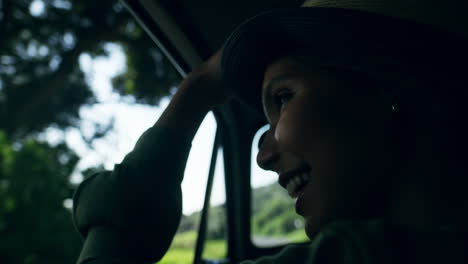 woman, smile and road trip looking out window