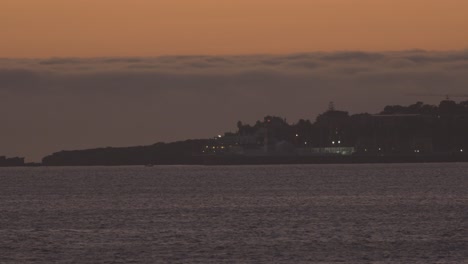 Lisboa-Portugal-Time-Lapse-4k,-Vista-Aérea-Ciudad-Horizonte-Puesta-De-Sol-Sobre-El-Océano-Timelapse-En-El-Distrito-De-Cascais