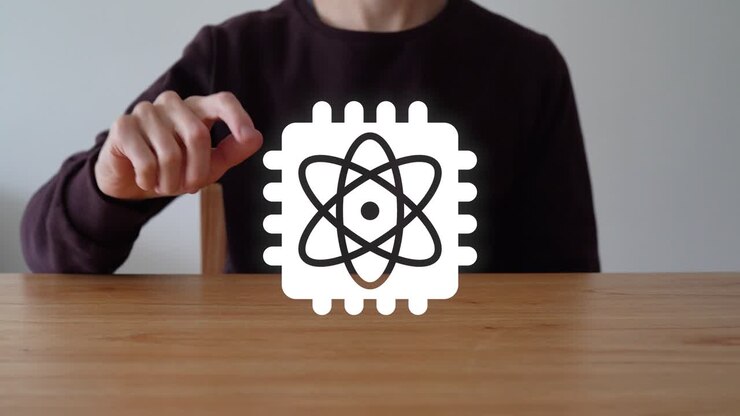 Person's Finger Touch The Quantum Computing Icon. - closeup shot