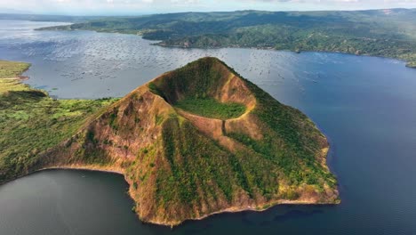 aerial approaching shot of famous taal volcano at taal lake in philippines, batangas province, south manila,tagaytay village