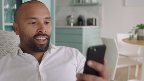 hearing impaired man having video chat on smartphone using sign language waving enjoying communication chatting on mobile phone