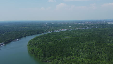 Drone-Shot-of-Bagan-Lalang-river-in-foggy-morning,-Malaysia