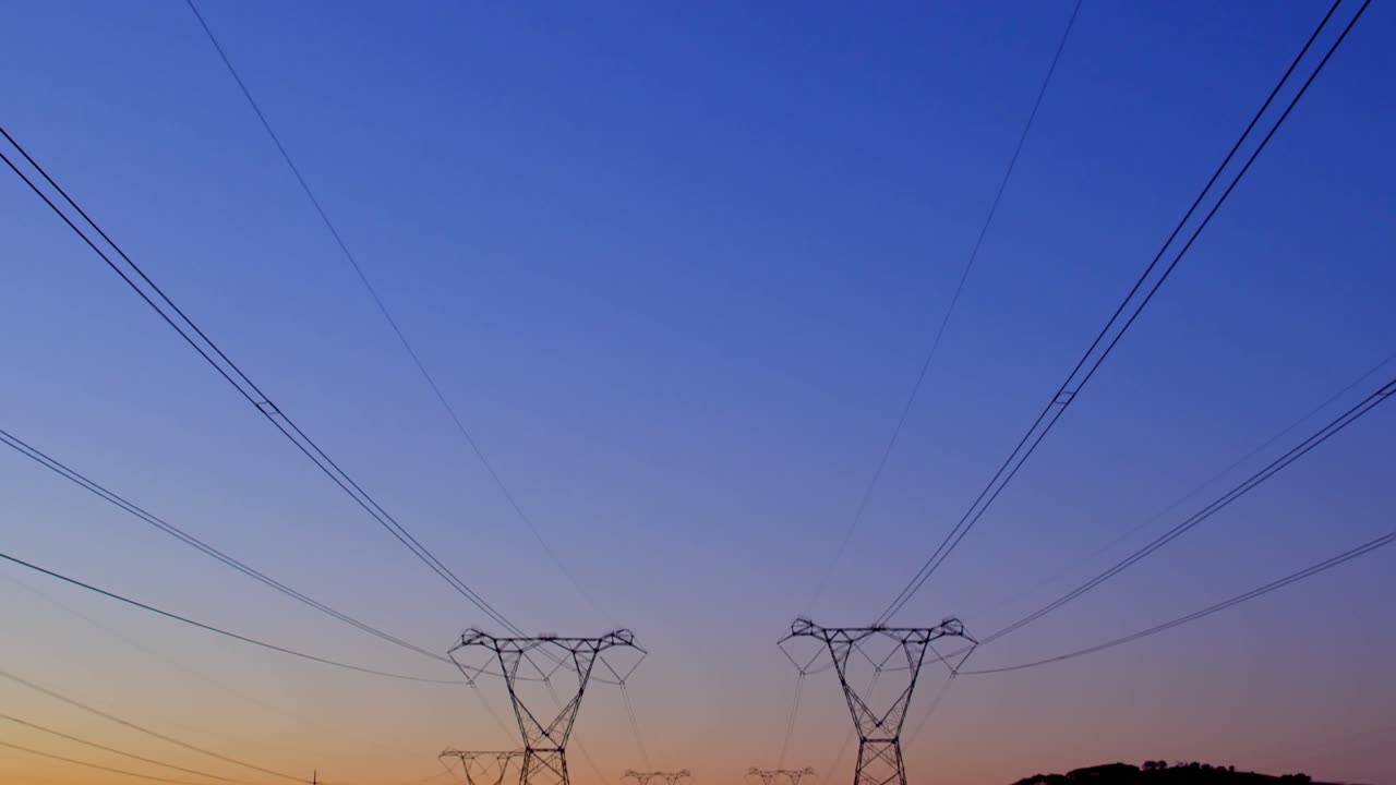 Electric poles during sunset 4K 4k