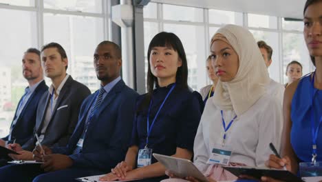 side view of an audience at a seminar