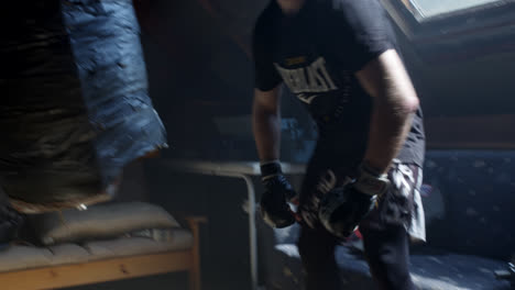 man training in attic home gym