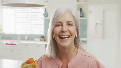 Portrait-of-happy-senior-caucasian-woman-smiling