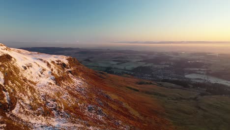 aerial majesty: sunset hues over scotland's timeless campsie fells, scottish hills and countryside near glasgow, scotland, united kingdom