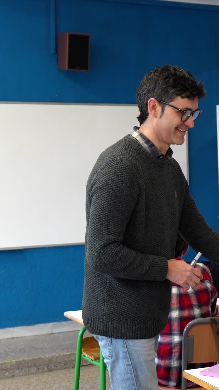 Teacher Explaining Geography to Students in Classroom
