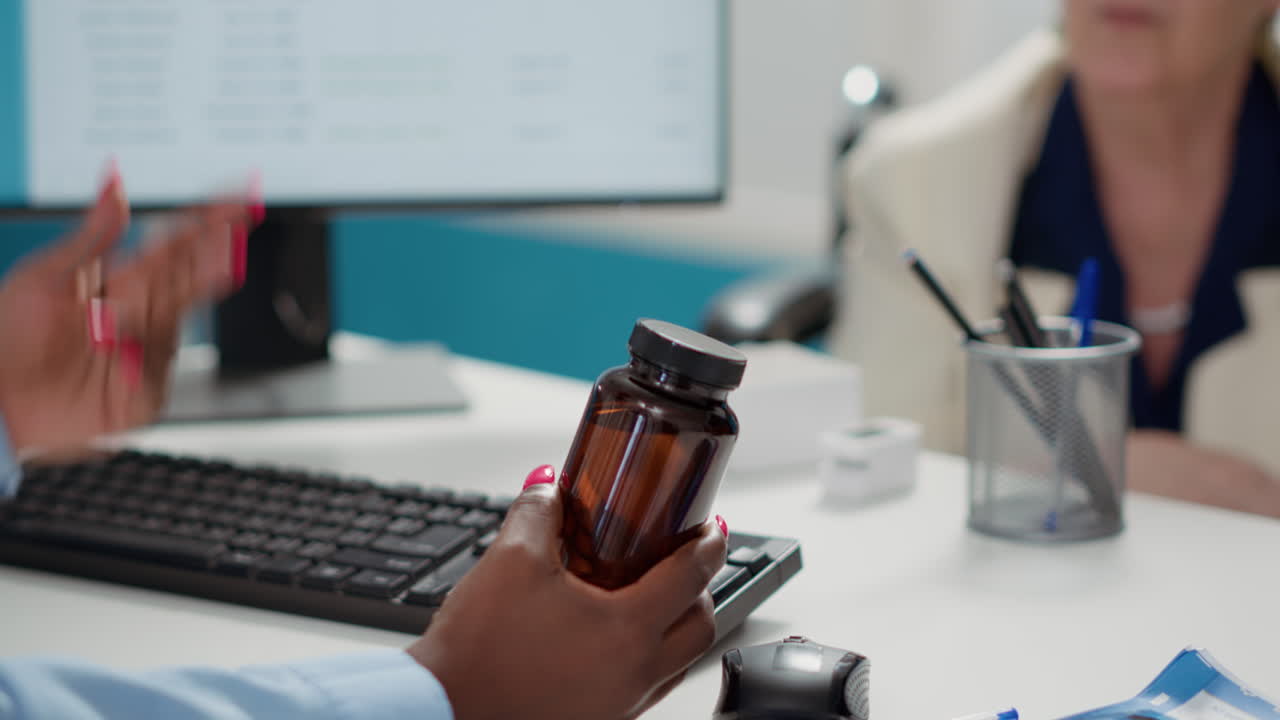 Doctor Explaining Medication to Senior Patient