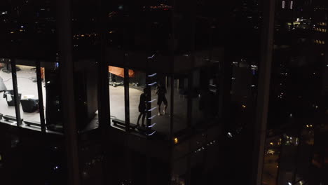Boxing Training in a City High-Rise at Night