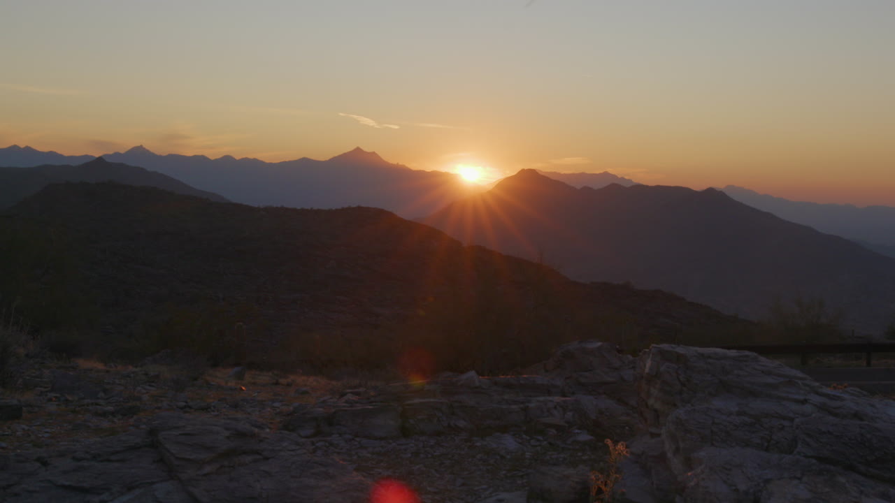 dolly shot of silhouette of mountains sunset at South Mountain in Phoenix, Arizona.