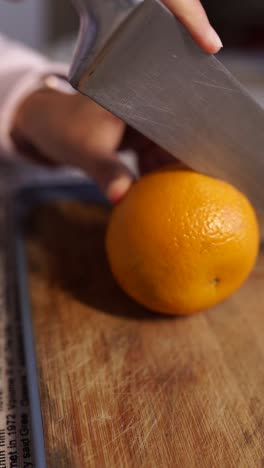 cutting an orange