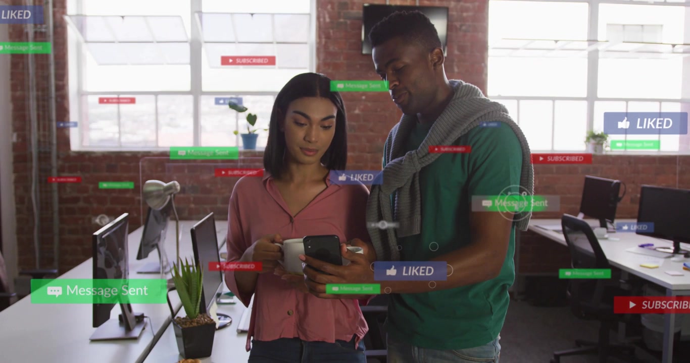 Man tapping phone, showing post to woman with mug, social media overlays multiplying across office