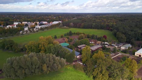 marvelous aerial view flight of horse farm paddock in brandenburg havelland germany at summer day 2022