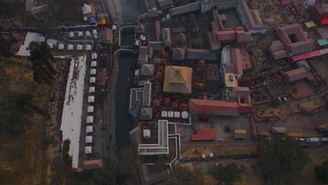 Aerial-drone-footage-showcases-the-stunning-Pashupatinath-temple-in-Kathmandu-during-the-golden-hour-before-sunset-on-Shivaratri