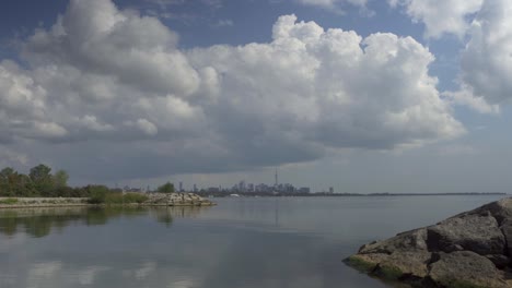 landscape view of downtown toronto and lake ontario, on a sunny day