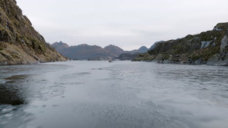 amazing drone flying low and fast over trollfjord, lofoten, norway